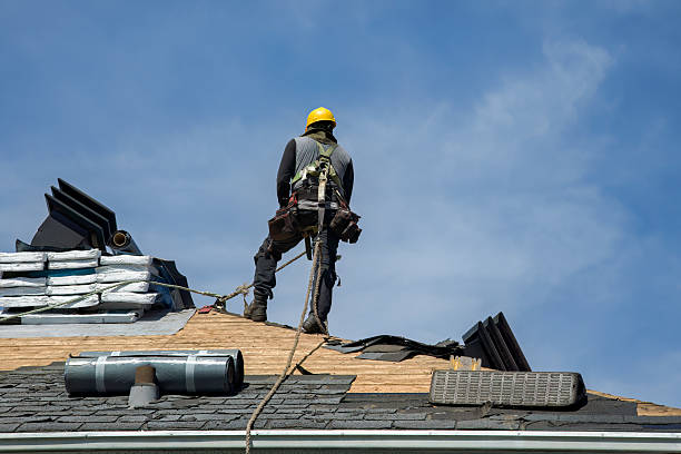 Professional Gutter Installation technician working in Lemont Furnace, PA